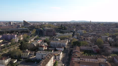 Back-aerial-drone-traveling-over-residential-Beaux-Arts-neighborhood-Montpellier